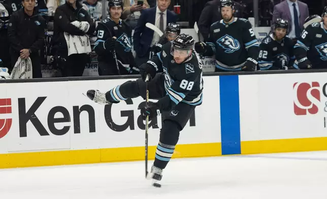 Utah Mammoth defenseman Nate Schmidt shoots against the Tampa Bay Lightning during the second period of an NHL hockey game Sunday, Nov. 2, 2025, in Salt Lake City. (AP Photo/Melissa Majchrzak)