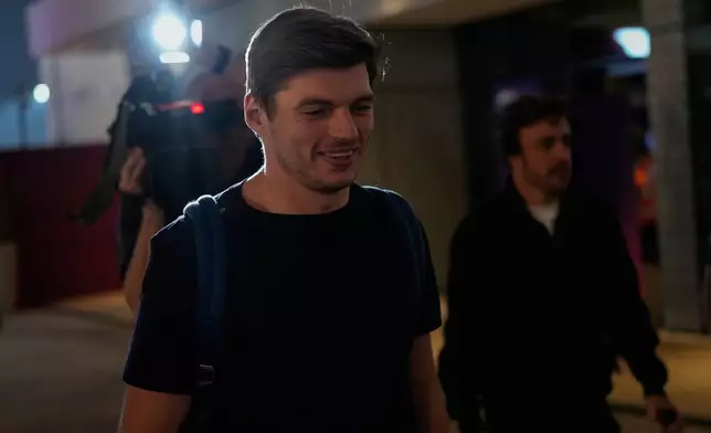 Red Bull driver Max Verstappen of the Netherlands arrives to the Lusail International Circuit ahead of the Qatar Formula One Grand Prix, in Lusail, Qatar, Thursday, Nov. 27, 2025. (AP Photo/Altaf Qadri)