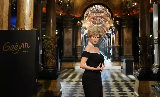 The life-size wax figure of Lady Diana is presented at Grevin Museum in Paris, France, Thursday, Nov. 20, 2025. (AP Photo/Christophe Ena)