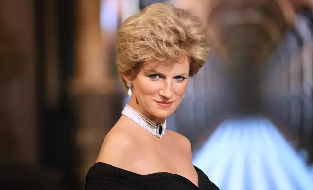 The life-size wax figure of Lady Diana is presented at Grevin Museum in Paris, France, Thursday, Nov. 20, 2025. (AP Photo/Christophe Ena)