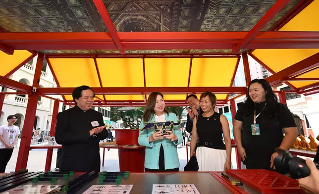 HKSAR Government Secretary for Culture, Sports and Tourism Rosanna Law, IoP Deputy Chairman and Trustee of The Hong Kong Jockey Club Charities Trust Ann Kung and other guests tour the HELLO! The Palace Museum — School Caravan.