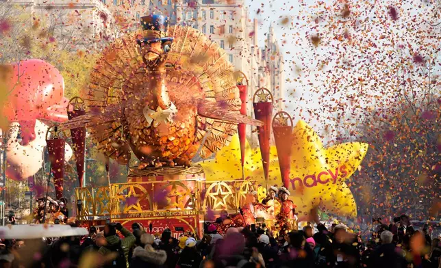 Confetti fills the air as the Tom Turkey float starts its way down Central Park West during the Macy's Thanksgiving Day Parade, Thursday, Nov. 27, 2025, in New York. (AP Photo/Frank Franklin)