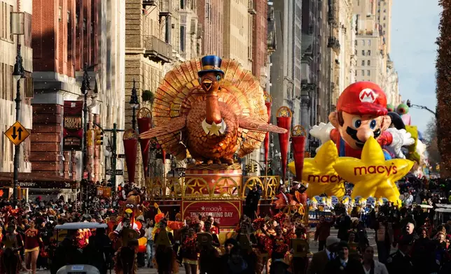 The Tom Turkey float makes its way down Central Park West to kick off the Macy's Thanksgiving Day Parade, Thursday, Nov. 27, 2025, in New York. (AP Photo/Eduardo Munoz Alvarez)