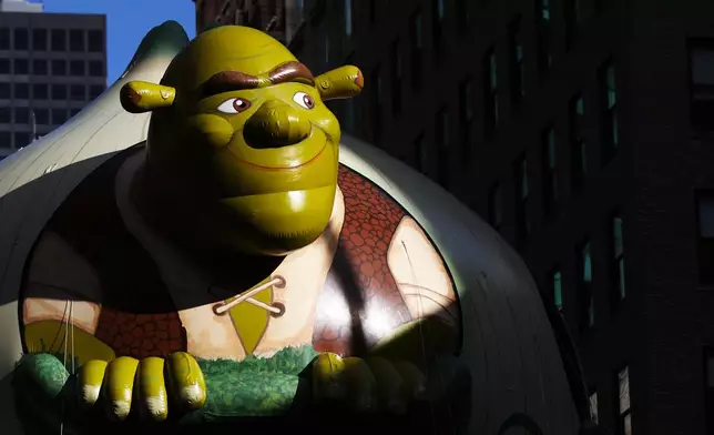 The Shrek balloon makes its way down Sixth Avenue during the Macy's Thanksgiving Day Parade, Thursday, Nov. 27, 2025, in New York. (AP Photo/Heather Khalifa)