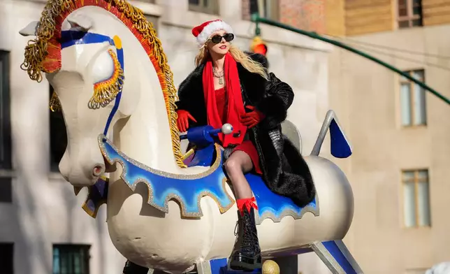 Taylor Momsen rides down Central Park West on the Rocking Horse float during the Macy's Thanksgiving Day Parade, Thursday, Nov. 27, 2025, in New York. (AP Photo/Frank Franklin)