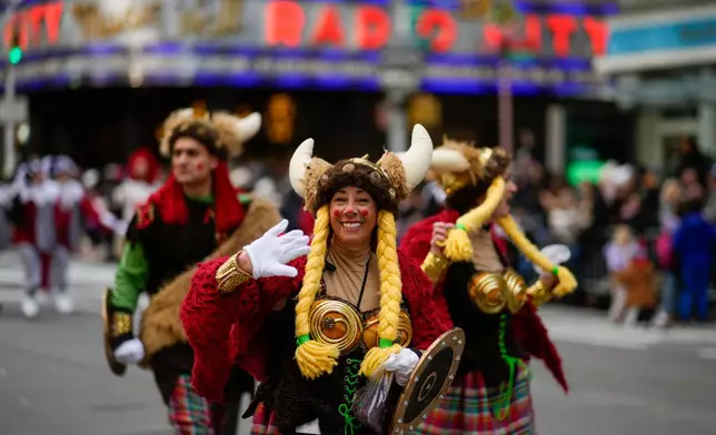 Viking clowns walk down Sixth Avenue during the Macy's Thanksgiving Day Parade, Thursday, Nov. 27, 2025, in New York. (AP Photo/Eduardo Munoz Alvarez)
