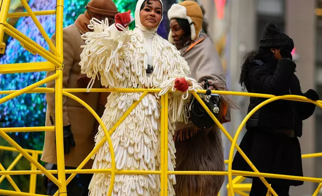 Teyana Taylor rides down Sixth Avenue on the Birds of a Feather Stream Together float during the Macy's Thanksgiving Day Parade, Thursday, Nov. 27, 2025, in New York. (AP Photo/Eduardo Munoz Alvarez)