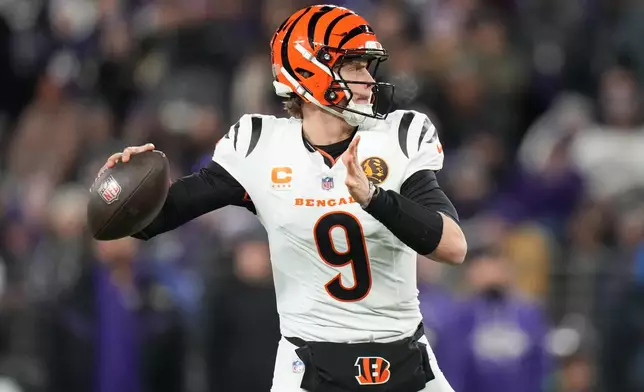 Cincinnati Bengals quarterback Joe Burrow throws a pass during the first half of an NFL football game against the Baltimore Ravens, Thursday, Nov. 27, 2025, in Baltimore. (AP Photo/Stephanie Scarbrough)