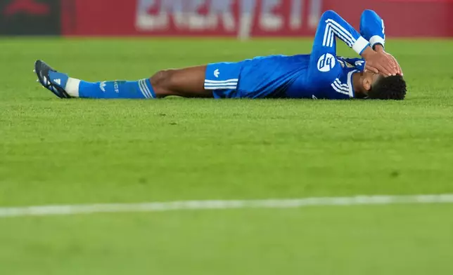 Real Madrid's Jude Bellingham reacts after the Spanish La Liga soccer match between Elche and Real Madrid in Elche, Spain, Sunday, Nov. 23, 2025. (AP Photo/Alberto Saiz)