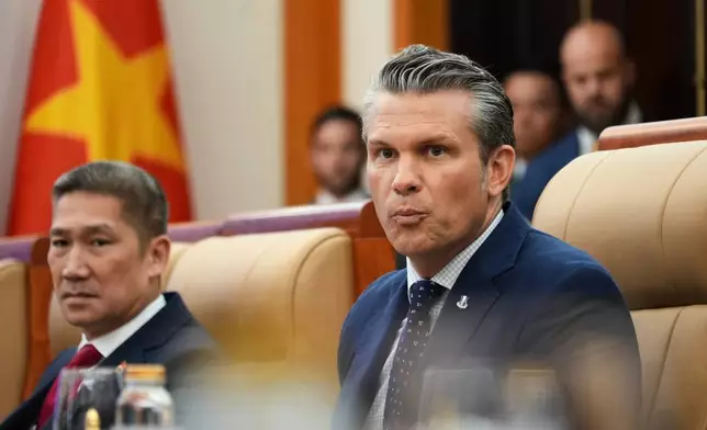 U.S. Defense Secretary Pete Hegseth speaks during a meeting with Vietnamese Defense Minister Phan Van Giang in Hanoi, Vietnam, Sunday, Nov. 2, 2025. (AP Photo/Hau Dinh)
