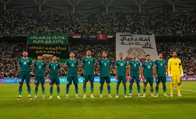 Iraq team players pose for a photo before the 2026 World Cup play off second leg match between Iraq and UAE in Basra, Iraq, Nov. 18, 2025. (AP Photo/Hadi Mizban)