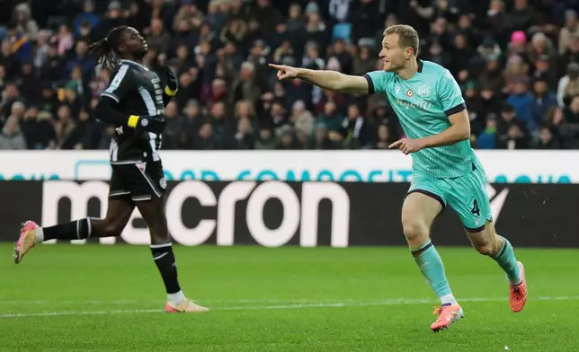 Bologna's Tommaso Pobega celebrates after scoring their side's first goal of the game during the Serie A soccer match between Udinese and Bologna in Udine, Italy, Saturday, Nov. 22, 2025. (Andrea Bressanutti/LaPresse via AP)