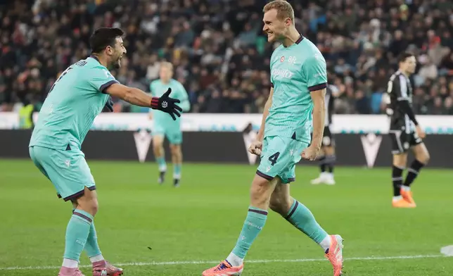 Bologna's Tommaso Pobega celebrates after scoring their side's first goal of the game during the Serie A soccer match between Udinese and Bologna in Udine, Italy, Saturday, Nov. 22, 2025. (Andrea Bressanutti/LaPresse via AP)