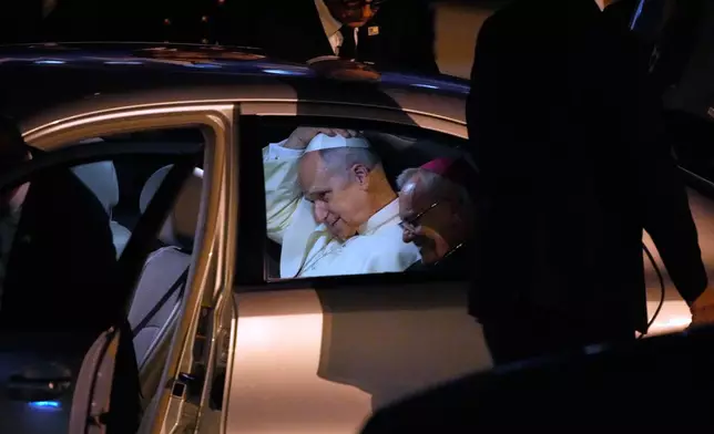 Pope Leo XIV sits in a car upon his arrival to Ataturk airport, in Istanbul, Turkey, Thursday, Nov. 27, 2025, during the first of his six-day trip to Turkey and Lebanon. (AP Photo/Emrah Gurel)