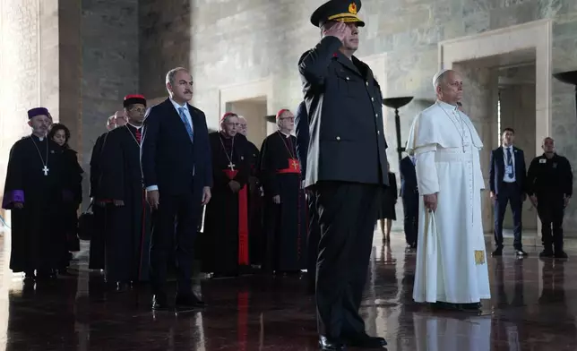 Pope Leo XIV visits the Ataturk Mausoleum in Ankara, Turkey, Thursday, Nov. 27, 2025. (AP Photo/Domenico Stinellis)