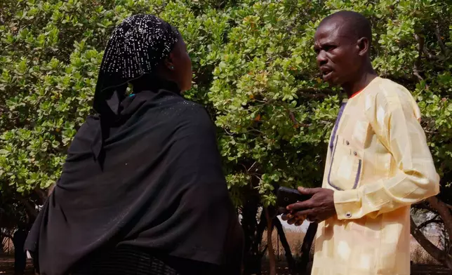 Parents of abducted school children gather at the St. Mary's Catholic Primary and Secondary School in Papiri community, Nigeria, Friday, Nov. 28, 2025. (AP Photo )