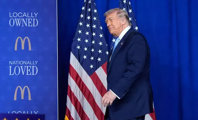 President Donald Trump arrives to speak at the McDonald's Impact Summit, Monday, Nov. 17, 2025, in Washington. (AP Photo/Alex Brandon)