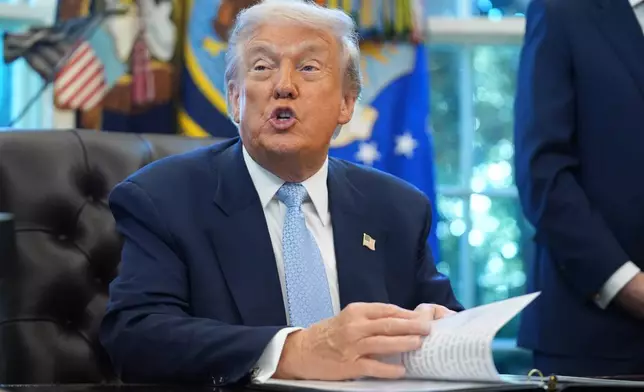 President Donald Trump speaks during a meeting with the White House task force on the 2026 FIFA World Cup in the Oval Office of the White House, Monday, Nov. 17, 2025, in Washington. (AP Photo/Evan Vucci)