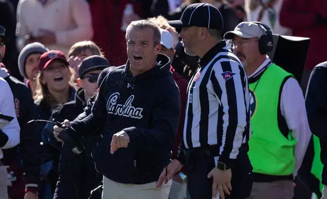 South Carolina head coach Shane Beamer argues a call during the first half of an NCAA college football game against the Clemson, Saturday, Nov. 29, 2025, in Columbia, S.C. (AP Photo/Scott Kinser)