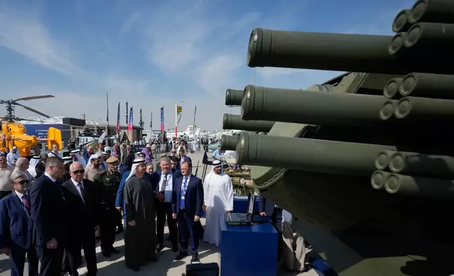ADDS THE NAME OF THE AIR DEFENSE SYSTEM - Sheikh Mohammed bin Zayed Al Nahyan, the president of the United Arab Emirates and the ruler of Abu Dhabi, looks at Russian Pantzir-SMD-E surface-to-air missile system at Russian pavilion during the opening day of the Dubai Air Show, United Arab Emirates, Monday, Nov. 17, 2025. (AP Photo/Altaf Qadri)