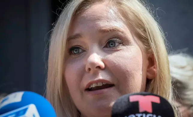 FILE - Virginia Giuffre speaks during a news conference outside a Manhattan court in New York, Aug. 27, 2019. (AP Photo/Bebeto Matthews, File)