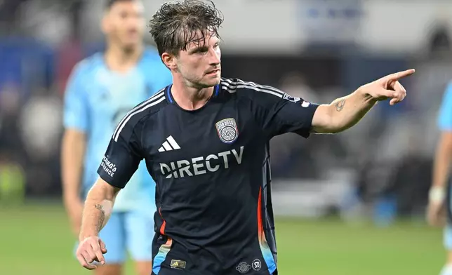 San Diego FC midfielder Anders Dreyer (10) gestures after scoring during the second half of MLS soccer's Western Conference semifinal against Minnesota United Monday, Nov. 24, 2025, in San Diego. (AP Photo/Denis Poroy)