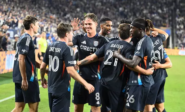 San Diego FC player celebrate after Anders Dreyer (10) scored during the second half of MLS soccer's Western Conference semifinal against Minnesota United Monday, Nov. 24, 2025, in San Diego. (AP Photo/Denis Poroy)