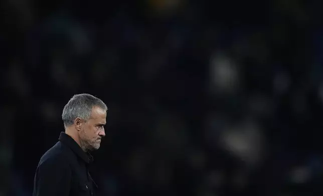 PSG's head coach Luis Enrique reacts after the Champions League opening phase soccer match between Paris Saint-Germain and Bayern Munich in Paris, France, Tuesday, Nov. 4, 2025. (AP Photo/Thibault Camus)