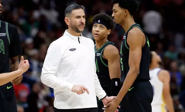 New Orleans Pelicans interim head coach James Borrego reacts as players walk off the court in a timeout during the third quarter of an NBA basketball game against the Golden State Warriors, Sunday, Nov. 16, 2025, in New Orleans. (AP Photo/Butch Dill)