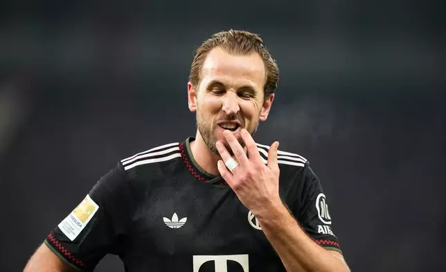 Bayern's Harry Kane reacts after the Bundesliga soccer match between Union Berlin and FC Bayern Munich in Berlin, Germany, Saturday, Nov. 8, 2025. (AP Photo/Martin Meissner)
