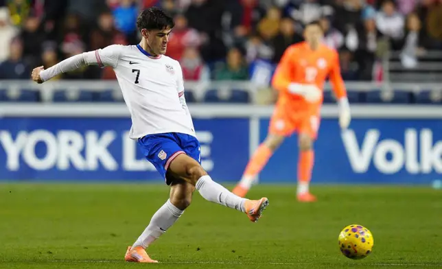 United States' Gio Reyna plays the ball during the first half of an international friendly soccer match against Paraguay, Saturday, Nov. 15, 2025, in Chester, Pa. (AP Photo/Derik Hamilton)