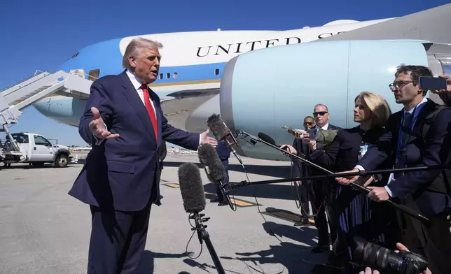 President Donald Trump speaks to the media after arriving at Palm Beach International Airport, Friday, Oct. 31, 2025, in West Palm Beach, Fla. (AP Photo/Manuel Balce Ceneta)