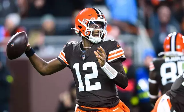Cleveland Browns quarterback Shedeur Sanders (12) throws a pass in the second half of an NFL football game against the Baltimore Ravens in Cleveland, Sunday, Nov. 16, 2025. (AP Photo/David Richard)