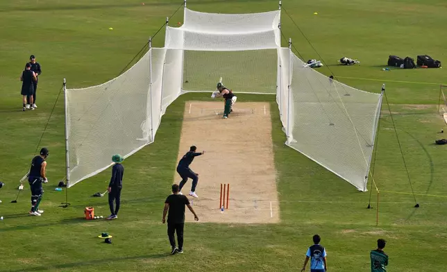 South Africa's Mathew Breetzke, top center, attends a practice session, in Faisalabad, Pakistan, Monday, Nov. 3, 2025. (AP Photo/Anjum Naveed)