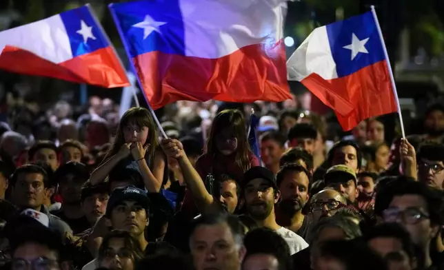 Supporters of presidential candidate Jose Antonio Kast of the Republican Party, gather to celebrate results in the general elections in Santiago, Chile, Sunday, Nov. 16, 2025. (AP Photo/Esteban Felix)