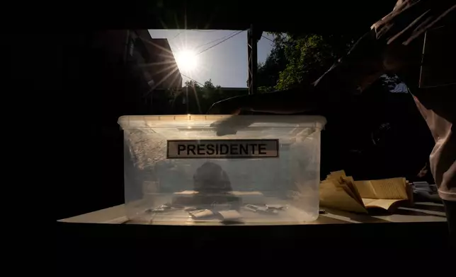 A ballot box sits at a polling station during general elections in Santiago, Chile, Sunday, Nov. 16, 2025. (AP Photo/Esteban Felix)
