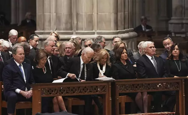 Former Presidents front row from left, George W. Bush with Laura Bush, Joe Biden with Jill Biden and former Vice Presidents Kamala Harris and Mike Pence with Karen Pence, right, during the funeral for former Vice President Dick Cheney at the Washington National Cathedral on Thursday, Nov. 20, 2025 in Washington. (AP Photo/Matt Rourke)