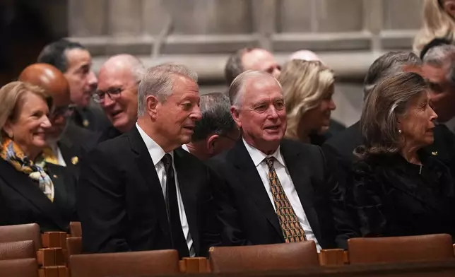 Former Vice President Al Gore and Dan Quayle and other invited guests, are seated before the funeral service for former Vice President Dick Cheney at the Washington National Cathedral, Thursday, Nov. 20, 2025 in Washington. (AP Photo/Matt Rourke)