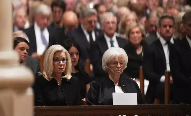 Lynne Cheney, seated front right, and daughter Liz Cheney, seated front left, look on during the funeral for former Vice President Dick Cheney at the Washington National Cathedral on Thursday, Nov. 20, 2025 in Washington. (AP Photo/Matt Rourke)