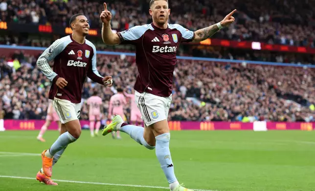 Aston Villa's Ross Barkley celebrates scoring their side's third goal of the game during the English Premier League soccer match between Aston Villa and AFC Bournemouth in Birmingham, Sunday, Nov. 9, 2025. (Nigel French/PA via AP)