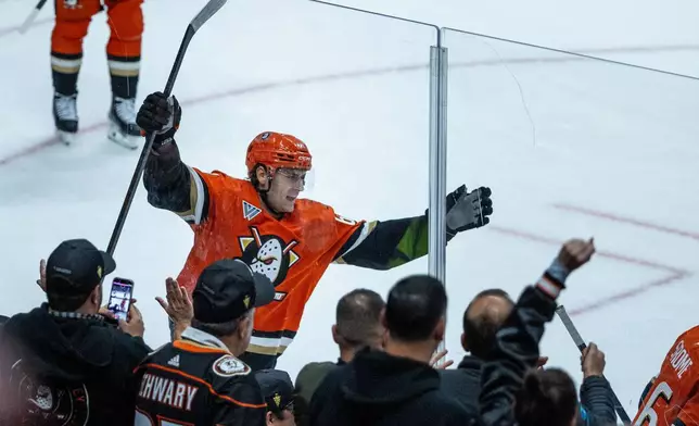 Anaheim Ducks center Ryan Strome (16) reacts after scoring against Boston Bruins during the second period of an NHL hockey game Wednesday, Nov. 19, 2025, in Anaheim, Calif. (AP Photo/Ethan Swope)