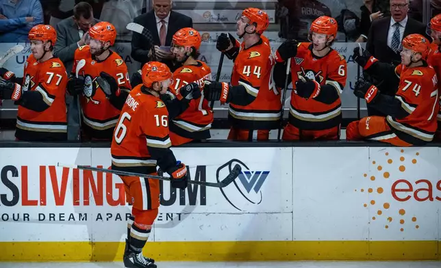 Anaheim Ducks center Ryan Strome (16) reacts after scoring against Boston Bruins during the second period of an NHL hockey game Wednesday, Nov. 19, 2025, in Anaheim, Calif. (AP Photo/Ethan Swope)