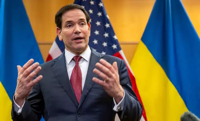 U.S. Secretary of State Marco Rubio talks to the press at the U.S. Mission to International Organizations in Geneva, Switzerland, Sunday, Nov. 23, 2025. (Martial Trezzini/Keystone via AP)