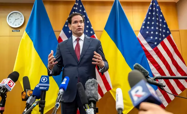 U.S. Secretary of State Marco Rubio talks to the press at the U.S. Mission to International Organizations in Geneva, Switzerland, Sunday, Nov. 23, 2025. (Martial Trezzini/Keystone via AP)