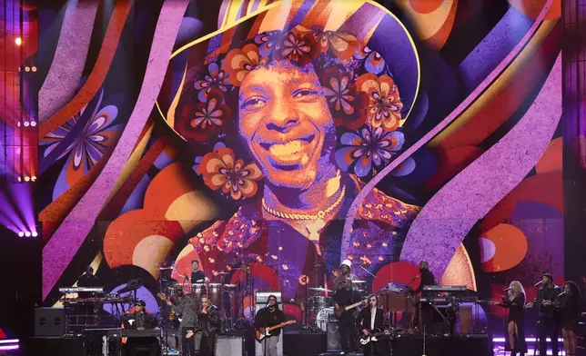 Stevie Wonder, from front left , Maxwell, Leon Thomas III and Beck perform A Sly and the Family Stone tribute during the 2025 Rock and Roll Hall of Fame Induction Ceremony on Saturday, Nov. 8, 2025, at L.A. Live in Los Angeles. (AP Photo/Chris Pizzello)
