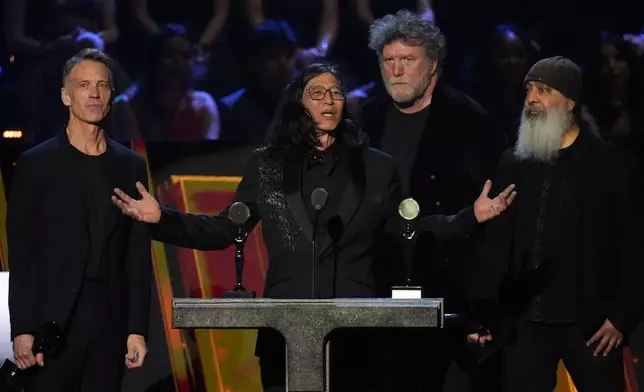 Matt Cameron, from left, Hiro Yamamoto, Ben Shepherd, and Kim Thayil of Soundgarden speak during the 2025 Rock and Roll Hall of Fame Induction Ceremony on Saturday, Nov. 8, 2025, at L.A. Live in Los Angeles. (AP Photo/Chris Pizzello)