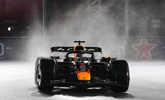 Red Bull driver Max Verstappen of the Netherlands drives during a qualifying session at the Formula One Las Vegas Grand Prix auto race, Friday, Nov. 21, 2025 in Las Vegas. (AP Photo/Eric Gay)
