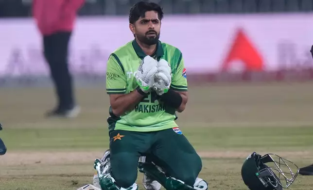 Pakistan's Babar Azam celebrates after his century during the second one day international cricket match between Pakistan and Sri Lanka, in Rawalpindi, Pakistan, Friday, Nov. 14, 2025. (AP Photo/Anjum Naveed)