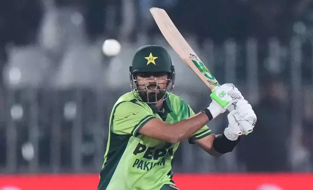 Pakistan's Babar Azam plays a shot during the second one day international cricket match between Pakistan and Sri Lanka, in Rawalpindi, Pakistan, Friday, Nov. 14, 2025. (AP Photo/Anjum Naveed)