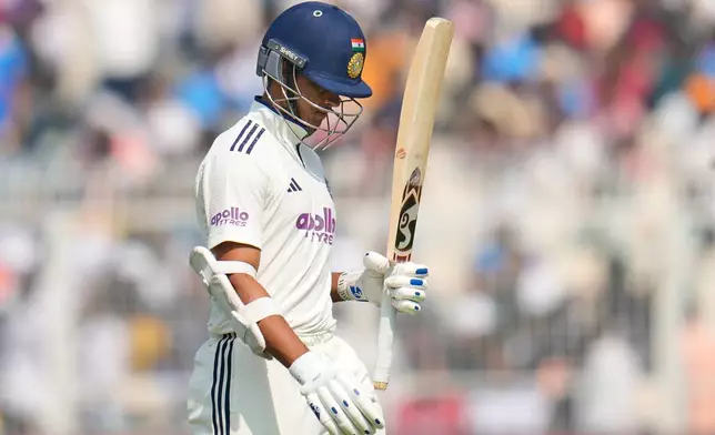 India's Yashasvi Jaiswal walks off the field after losing his wicket on the third day of the first cricket test match between India and South Africa in Kolkata, India, Sunday, Nov. 16, 2025. (AP Photo/Aijaz Rahi)